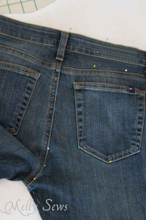Outline the pockets, yoke and waistband with pins - make a pattern from your jeans - http://mellysews.com