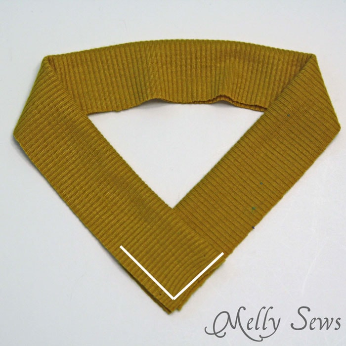 How to sew a V neck - overlap binding to form the V - http://mellysews.com