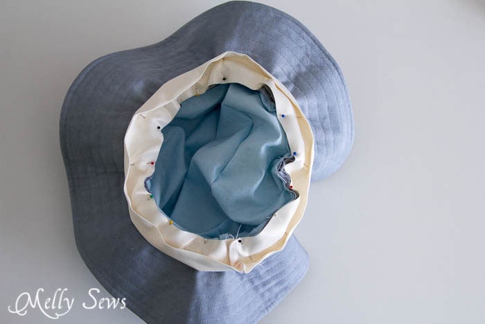 Finish fat with ribbon - How to sew a hat - http://mellysews.com