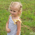 The bows on the shoulders are adorable - Super Simple and Free Girls Dress pattern by mellysews.com