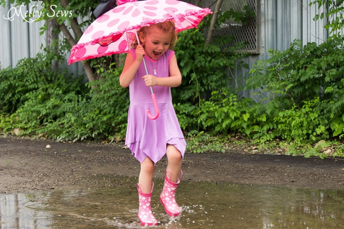 Splashing in puddles - Handkerchief Hem Dress tutorial - Sew a knit girls dress with this free pattern - Melly Sews