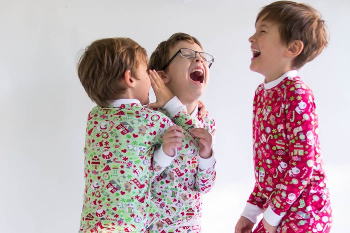 Little boys having fun in their custom pajamas - DIY Sew knit kids Christmas pajamas - with FREE pattern! - Melly Sews