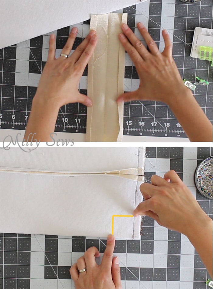 Step 5 to sew a travel toiletry bag is to sew the handle by folding raw edges in 