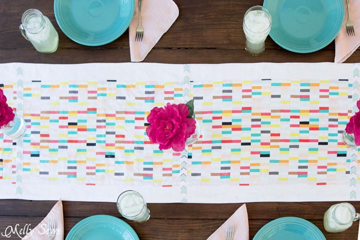 Cheerful place settings for an outdoor party - - Boho Fringe Table Runner Tutorial - Boardwalk Delight Fabrics - Melly Sews