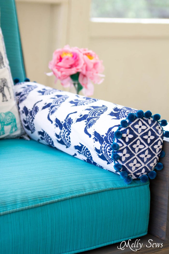 Outdoor sofa with bolster pillow - Sew a Bolster Pillow - Bolster Pillow Tutorial - Love this Boho Style pillow with pom pom trim! - Melly Sews