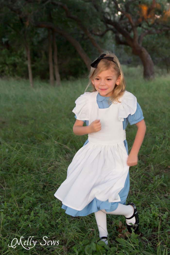 Alice running after the White Rabbit - Alice in Wonderland Costume - Sew a DIY Alice in Wonderland costume with a free pattern and tutorial from Melly Sews