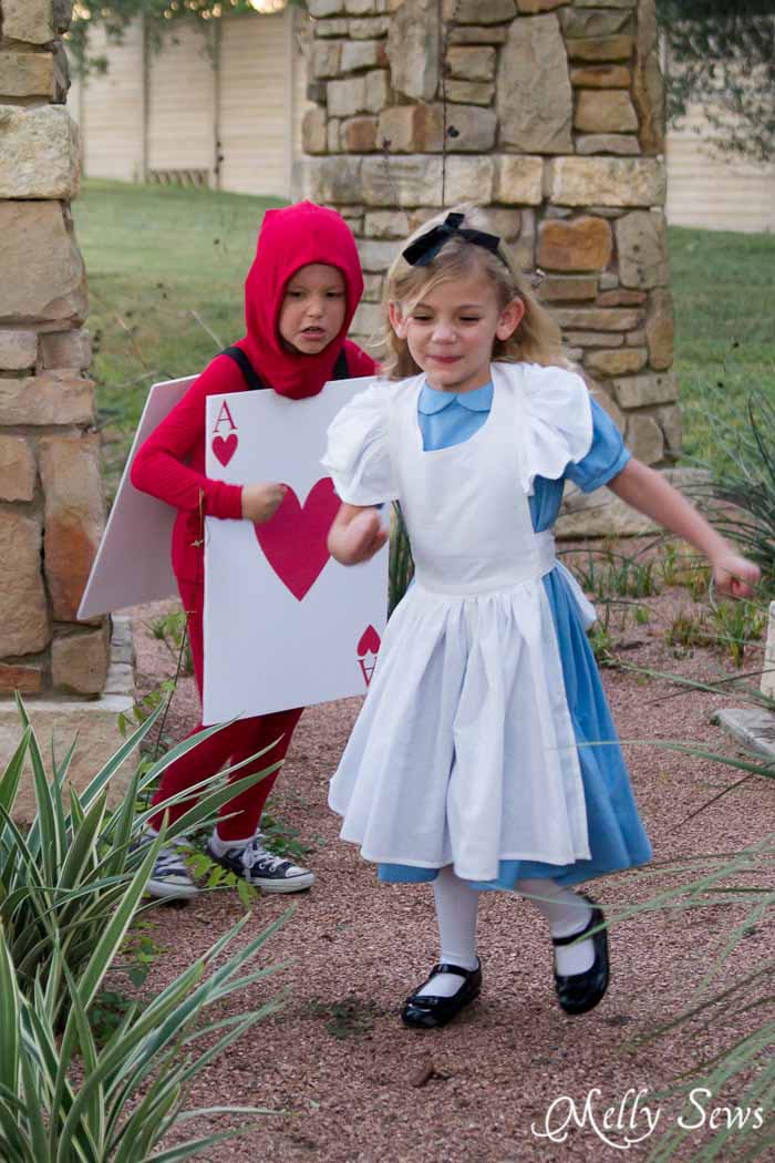 Alice Chased by a Card Soldier - Alice in Wonderland Costume - Sew a DIY Alice in Wonderland costume with a free pattern and tutorial from Melly Sews