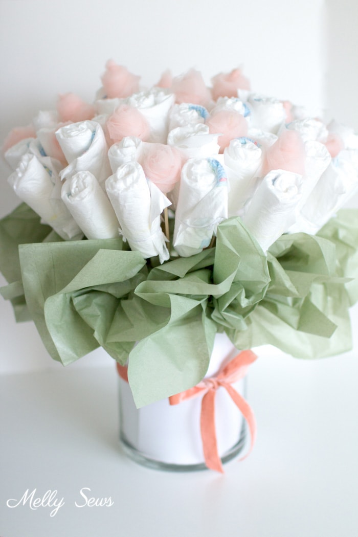 How to Make a Diaper Bouquet - What a Cute Alternative to a Diaper Cake - and it could be nursery decor while being used! Tutorial and video from Melly Sews 