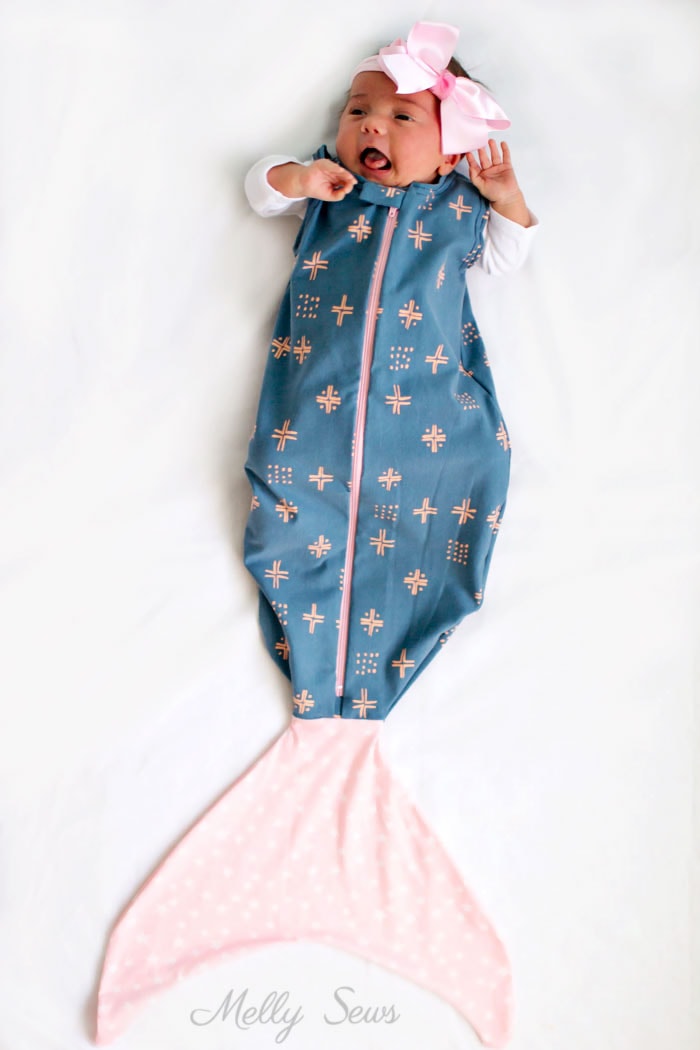 This would be such a great gift - Sew a Mermaid Sleep Sack - a Mermaid blanket for babies! Get the sewing pattern and tutorial including video on Melly Sews