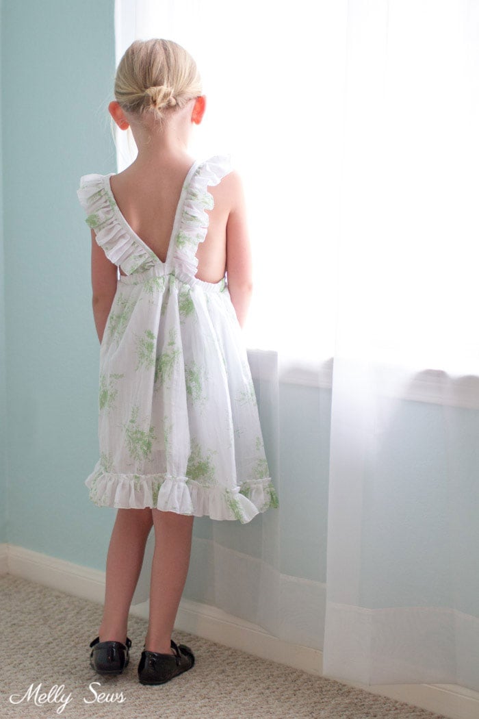 Back view - Sew a Ruffle Strap Pinafore Dress - Apron Dress for Girls - with free pattern and video tutorial on Melly Sews