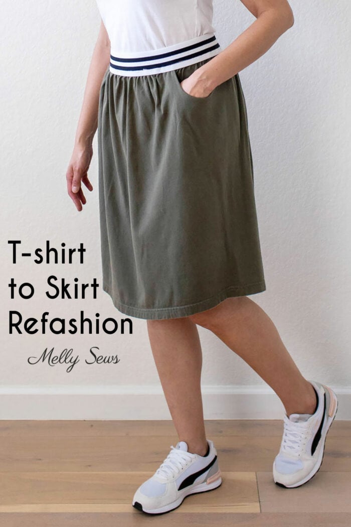 Lower body of a woman wearing a knee length skirt sewn from a refashioned t-shirt