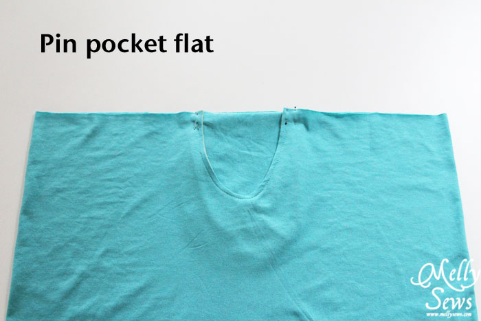 Pin pocket to waistband