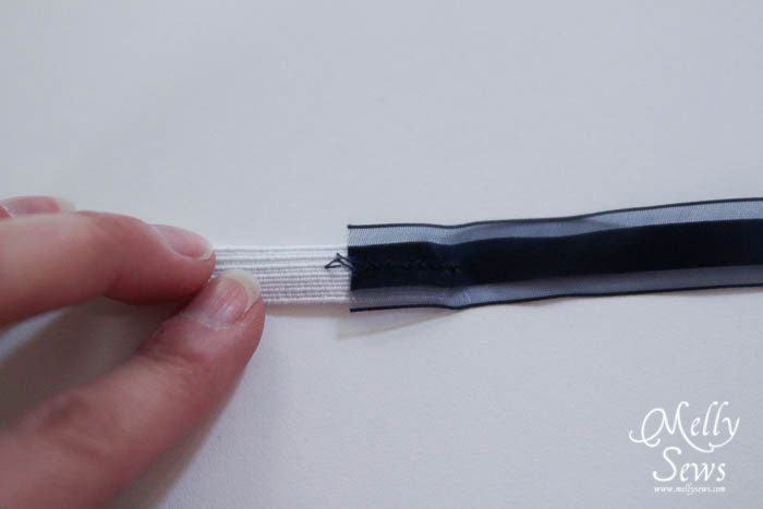 Sewing ribbon to elastic to make a drawstring 