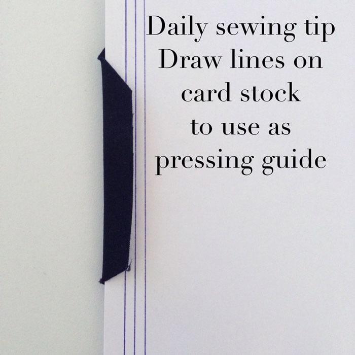 DIY Pressing guide made from card stock to iron hems in fabric