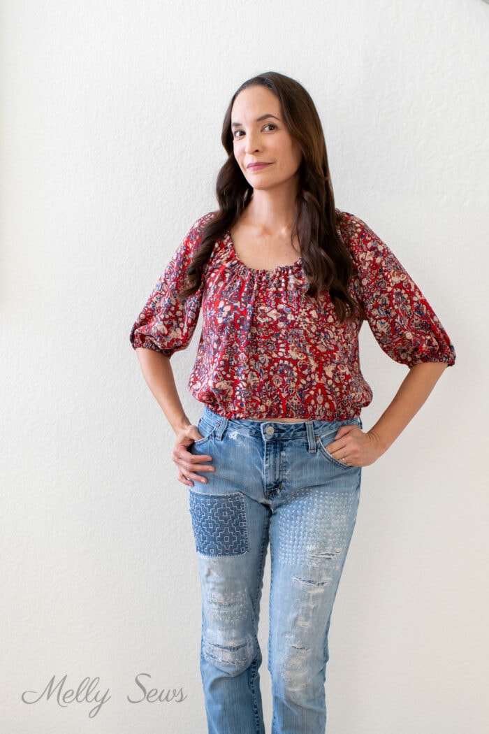 Red print peasant blouse and custom embroidered jeans outfit