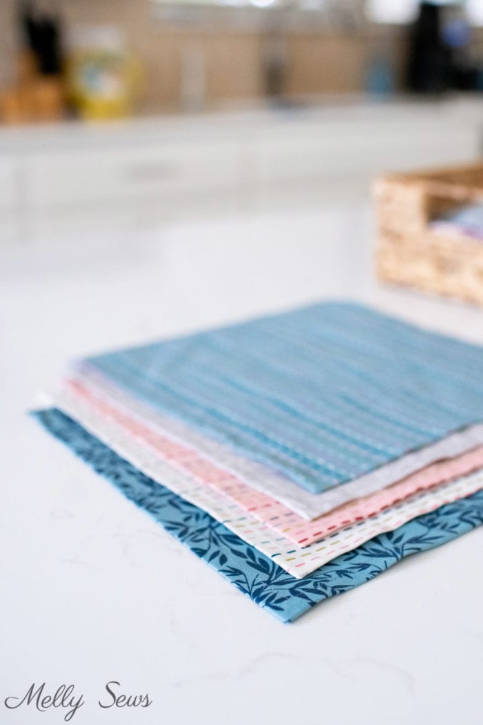 Cloth napkins made from quilting cotton fabric on a countertop