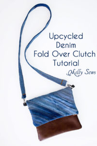 Sew a DIY fold over clutch using recycled denim and leather or faux leather with an optional cross body strap - Melly Sews Tutorial