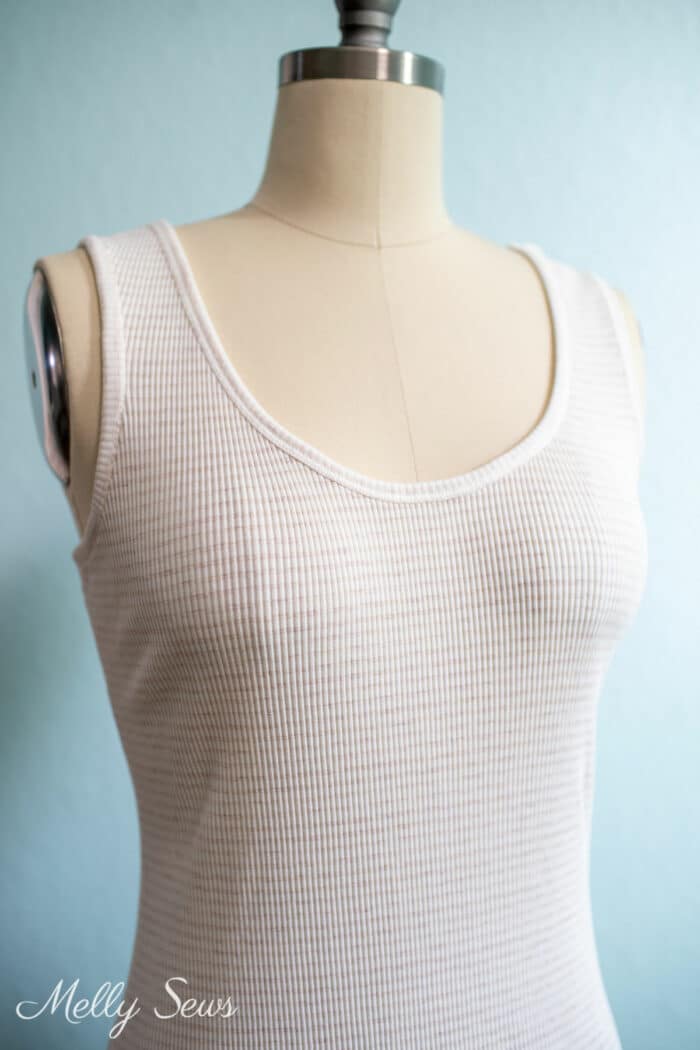 Ivory striped tank top on a sewing dress form