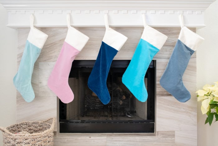 Colorful velvet DIY Christmas stockings sewn from hand dyed fabric with a free pattern