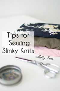 stack of lightweight knit fabrics and text Tips for Sewing Slinky Knits