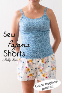 How to sew pajama shorts - a good beginner sewing project. Woman wearing a blue tank top and white floral pajama shorts