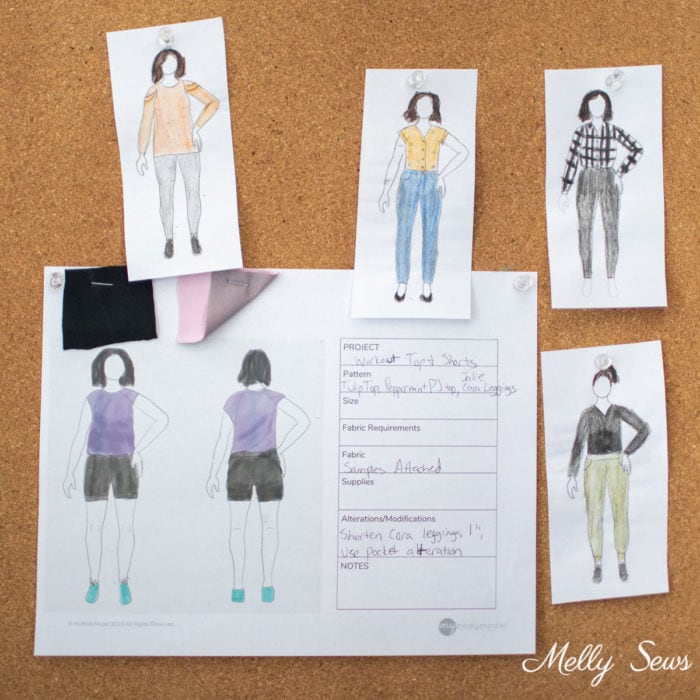 Croquis sketches, fabric samples and sewing details pinned to a cork board