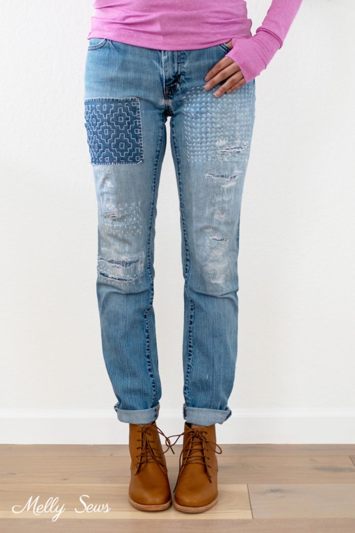 Woman wearing Sashiko mended jeans