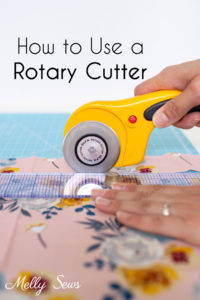 Using a rotary cutter, ruler and mat to cut fabric straight