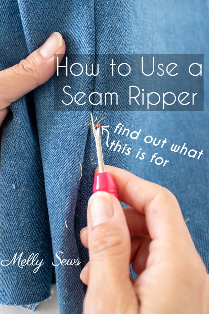 How to use a seam ripper - a hand holding a seam ripper to fix sewing mistakes