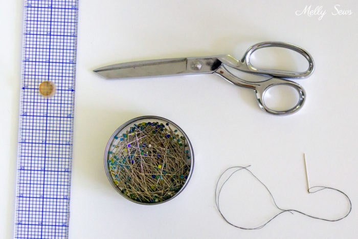 Ruler, pins, thread, sewing needle and scissors are supplies needed to hem pants