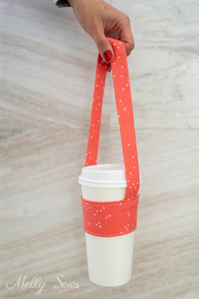 Cup carrying handle sewn in salmon fabric