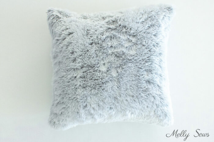 Home sewn gray faux fur pillow