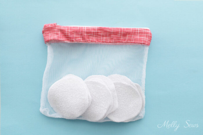 Wash bag with reusable makeup remover pads inside to wash.
