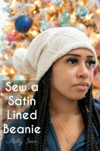 Sew a Satin Lined Beanie Hat - Girl Wearing an Ivory Sweater Knit Beanie Cap