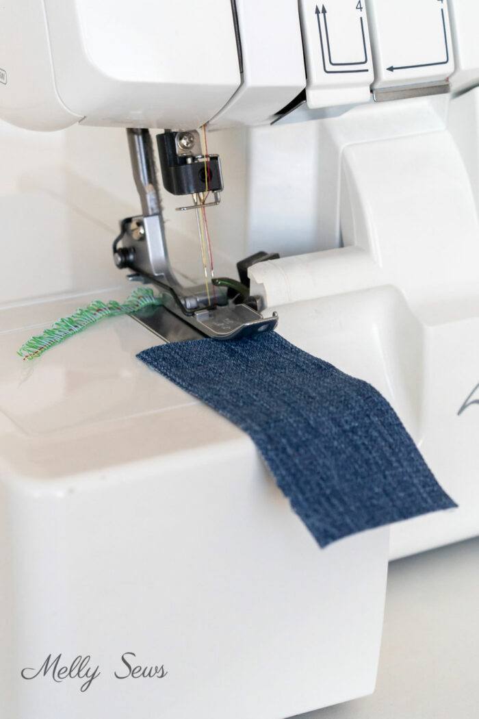 How to begin a serger seam - blue fabric under serger presser foot
