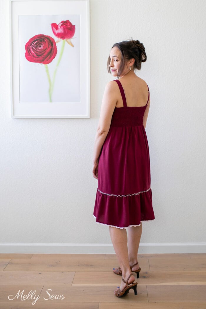 Back view of a woman wearing a one length sundress