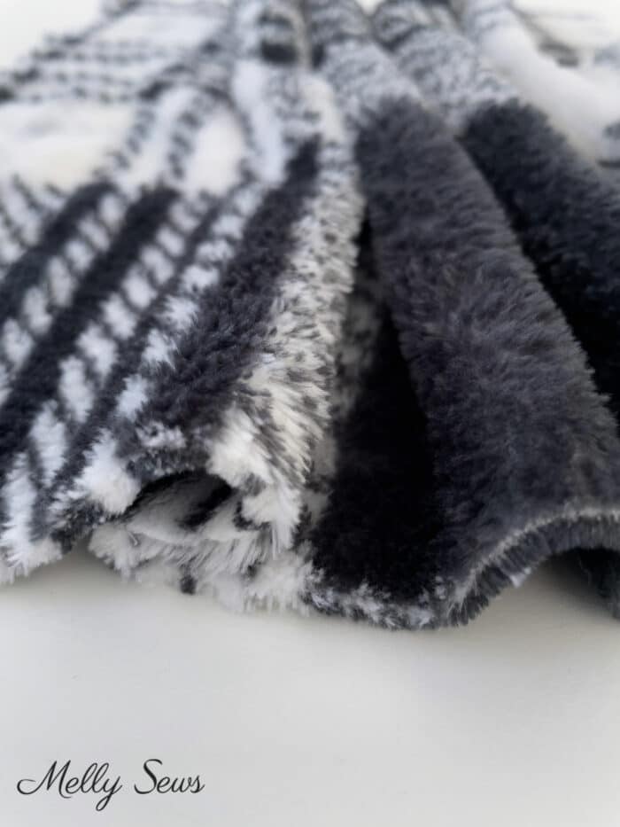 Black and white fuzzy fleece fabric