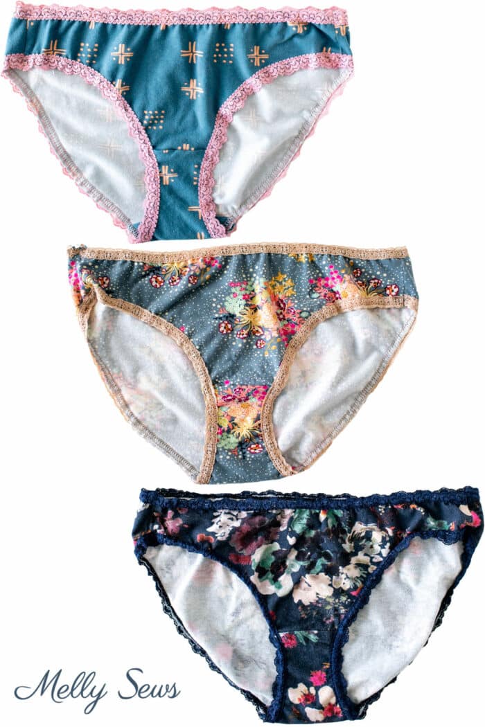 Blue and coral abstract print, gray floral and navy blue floral underwear with lace trim
