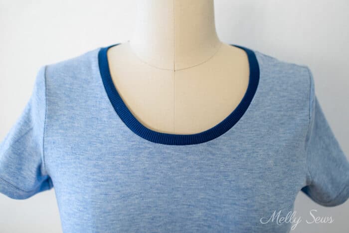 Close up of t-shirt neckband on a dress form