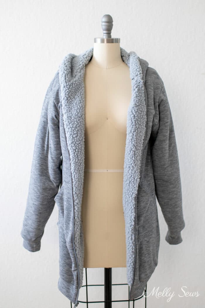 Gray hoodie with fleece lining on a dress form