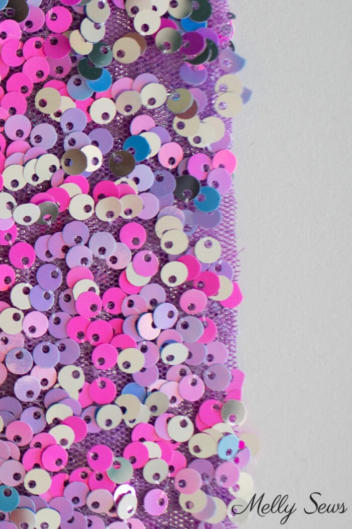Multicolored pink, silver and lavender sequin fabric