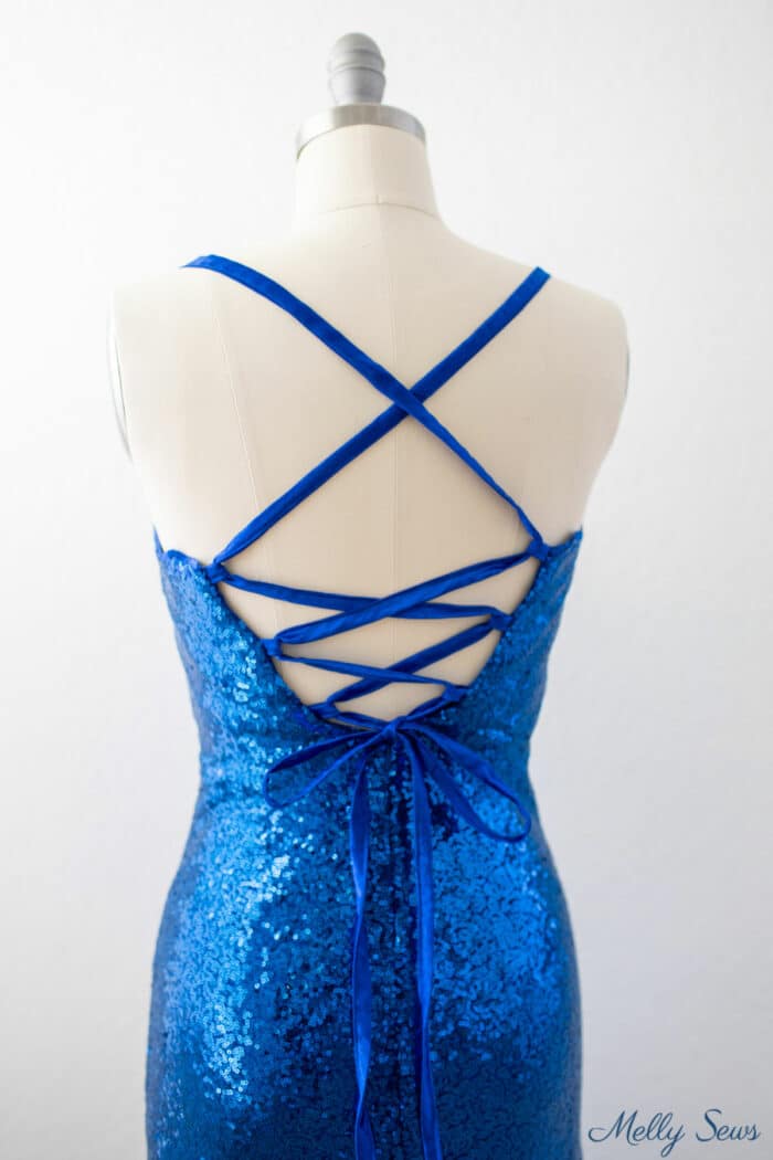 Blue formal dress with tie back as an example of how to sew it